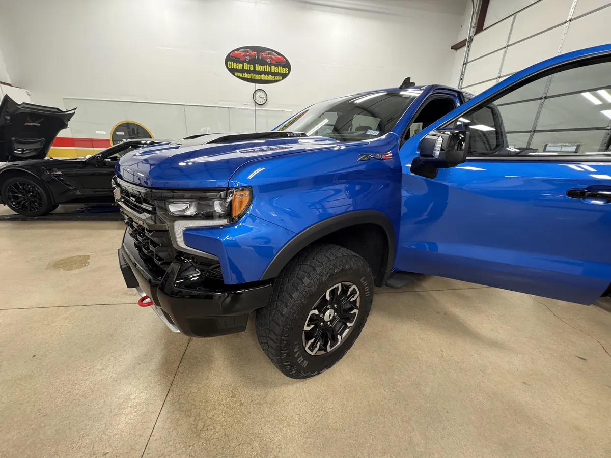 Blue Chevrolet Silverado ZR2 paint protection film installation at Clear Bra North Dallas