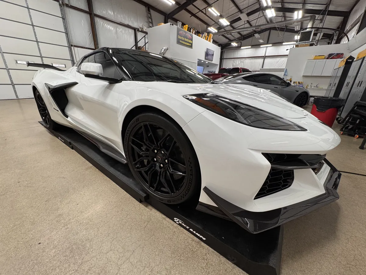 White Corvette with complete paint protection film wrap at Clear Bra North Dallas installation facility